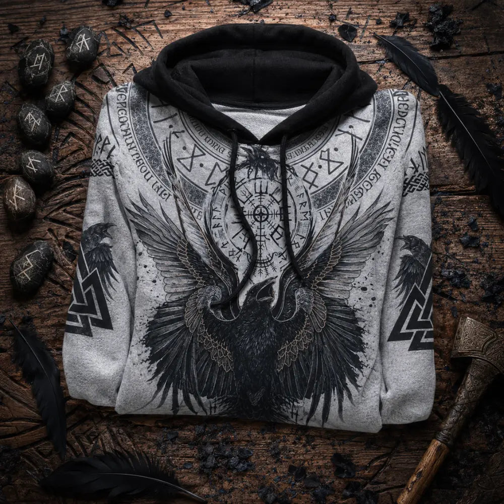 wikinger raben hoodie flatlay runen axt feder holzbrett